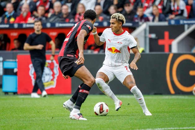 LEVERKUSEN, GERMANY - SEPTEMBER 20, 2026: Antonio Nusa (RB Leipzig, 7), Jarell Quansah (Bayer 04 Leverkusen, 4) during the German Bundesliga match on gameday 4 between Bayer 04 Leverkusen vs. RB Leipzig at BayArena on September 20, 2026 in Leverkusen, Germany. DFL REGULATIONS PROHIBIT ANY USE OF PHOTOGRAPHS AS IMAGE SEQUENCES AND OR QUASI-VIDEO. Northrhine-Westphalia Germany Copyright: xAxelxKohringx