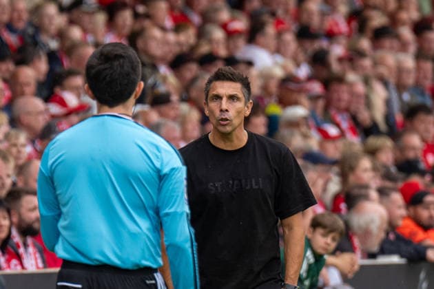 September 20, 2026: Energie Cottbus vs. FC St. Pauli, Matchday 6 of the 2. Bundesliga at the LEAG Energie Stadium; Marcel Rapp, Head Coach, FC St. Pauli vs. Linesman IMPORTANT NOTICE: In accordance with DFL and DFB regulations, it is prohibited to use or allow the use of photographs taken in the stadium and or during the game in the form of sequential images and or video-like photo sequences. Copyright: xJamesxZabelx
