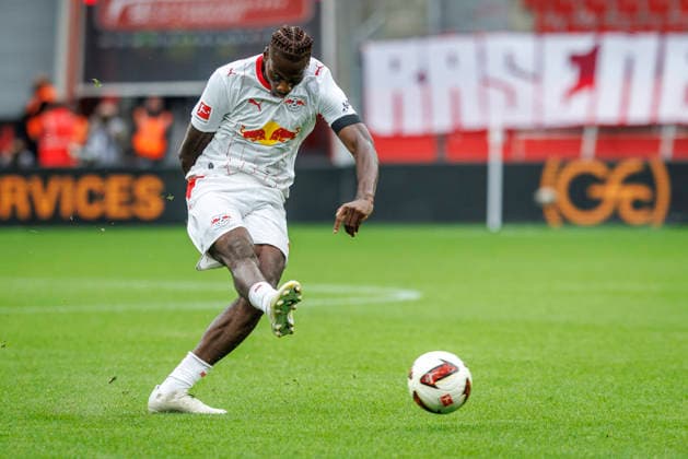 LEVERKUSEN, GERMANY - SEPTEMBER 20, 2026: Ezechiel Banzuzi (RB Leipzig, 6) shoots on the goal during the German Bundesliga match on gameday 4 between Bayer 04 Leverkusen vs. RB Leipzig at BayArena on September 20, 2026 in Leverkusen, Germany. DFL REGULATIONS PROHIBIT ANY USE OF PHOTOGRAPHS AS IMAGE SEQUENCES AND OR QUASI-VIDEO. Northrhine-Westphalia Germany Copyright: xAxelxKohringx