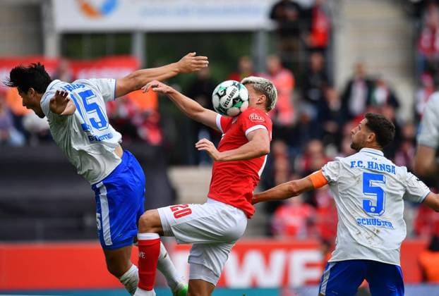 Rot Weiss Essen vs. Hansa Rostock ** FOR EDITORIAL USE ONLY ** EDITORIAL USE ONLY ** p Soccer 3rd Division, Matchday 7: Rot-Weiss Essen vs. Hansa Rostock on September 20, 2026, at the Stadion an der Hafenstrasse in Essen. Ahmet Gürleyen (Hansa Rostock), left: Marek Janssen (Rot-Weiss Essen), center: Marco Schuster (Hansa Rostock), right: Essen, North Rhine-Westphalia, Germany. Copyright ThorstenxTillmann Copyright: ThorstenxTillmann doc87onv758tewkf1rw1cg3 ,EDITORIAL USE ONLY Copyright: ThorstenxTillmann