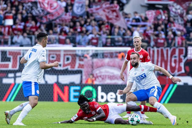 3rd Division, Matchday 7: Rot-Weiss Essen vs. Hansa Rostock, September 20, 2026; Franci Bouebari (Rot-Weiss Essen), 19, Benno Dietze, Hansa Rostock, 42. 3rd Division, Matchday 7: Rot-Weiss Essen vs. Hansa Rostock, Stadion an der Hafenstraße, Essen, September 20, 2026. DFL regulations prohibit any use of photographs as image sequences and or quasi-video. Copyright: xBEAUTIFULxSPORTS Buriakovx