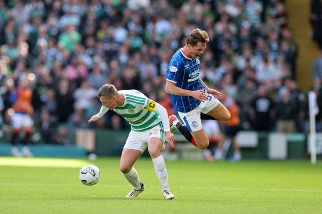 Celtic captain Callum McGregor battles for the ball with James Penrice of Rangers during the William Hill Scottish Premiership match at Parkhead, Glasgow. Celtic v Rangers - William Hill Scottish Premiership - Parkhead, Glasgow, Lanarkshire, Scotland, UK - 20 Sep 2026Glasgow Parkhead Lanarkshire United Kingdom  Copyright: xO Rourke RangersxFC Shutterstockx 17159973ee