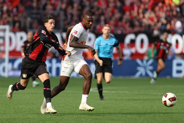 Afonso Moreira of Bayer 04 Leverkusen and Ezechiel Banzuzi of RB Leipzig battle for the ball during the Bundesliga match between Bayer 04 Leverkusen and RB Leipzig at BayArena on September 20, 2026, in Leverkusen, Germany. Photo by Oliver Kaelke, DeFodi Images. Afonso Moreira of Bayer 04 Leverkusen and Ezechiel Banzuzi of RB Leipzig battle for the ball during the Bundesliga match between Bayer 04 Leverkusen and RB Leipzig at BayArena on September 20, 2026 in Leverkusen, Germany. Photo by Oliver Kaelke, DeFodi Images. DFB and DFL regulations prohibit any use of photographs as image sequences and or quasi-video. Photo by Oliver Kaelke, DeFodi Images.