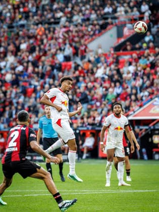 LEVERKUSEN, GERMANY - SEPTEMBER 20, 2026: Tidiam Gomis (RB Leipzig, 27) with a header during the German Bundesliga match on gameday 4 between Bayer 04 Leverkusen vs. RB Leipzig at BayArena on September 20, 2026 in Leverkusen, Germany. DFL REGULATIONS PROHIBIT ANY USE OF PHOTOGRAPHS AS IMAGE SEQUENCES AND OR QUASI-VIDEO. Northrhine-Westphalia Germany Copyright: xAxelxKohringx