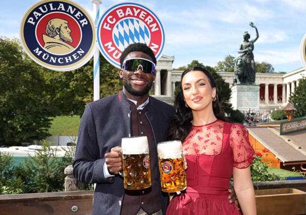 Alphonso Davies and his wife Sheyenne Jen, FC Bayern Munich soccer players, on their traditional visit to the Munich Oktoberfest (Wiesn), September 20, 2026. PHOTO: FC Bayern via Mladen Lackovic