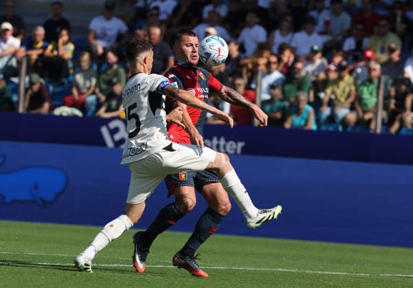 Genoa™s Milutin Osmajic fights for the ball with Parma™s Enrico Delprato during the Serie A soccer match between Parma and Genoa at the Ennio Tardini Stadium in Parma, north west Italy - September 20, 2026. - Soccer  Copyright: xGiannixSantandrea LaPressex