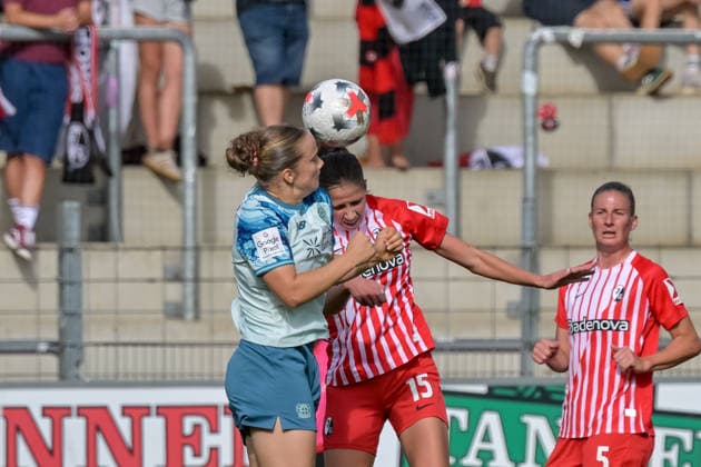 Paulina Platner, Bayer 04 Leverkusen Women, 06; Maj Schneider, SC Freiburg Women, 15, during a header duel (GER), SC Freiburg vs. Bayer 04 Leverkusen, Women s Soccer, Bundesliga, Matchday 5, 2026–2027 season, September 20, 2026 DFB regulations prohibit any use of photographs as image sequences and or quasi-video GER, SC Freiburg vs. Bayer 04 Leverkusen, Women’s Soccer, Bundesliga, Matchday 5, 2026–2027 Season, September 20, 2026, Freiburg Copyright: xEibner-Pressefotox EP_THS