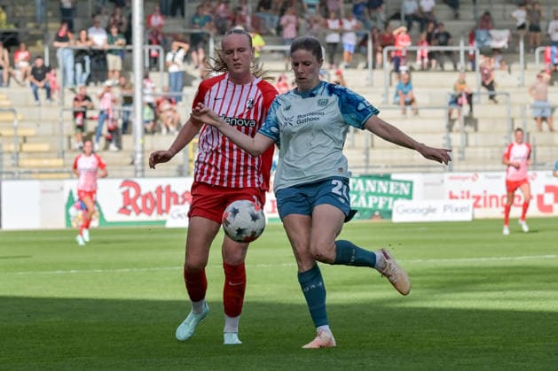 Lilla Turanyi, Bayer 04 Leverkusen Women, 24, Luca Emily Birkholz, SC Freiburg Women, 23, battling for the ball (GER), SC Freiburg vs. Bayer 04 Leverkusen, Women’s Soccer, Bundesliga, Matchday 5, 2026–2027 Season, September 20, 2026 DFB regulations prohibit any use of photographs as image sequences and or quasi-video, GER, SC Freiburg vs. Bayer 04 Leverkusen, Women’s Soccer, Bundesliga, Matchday 5, 2026–2027 Season, September 20, 2026, Freiburg Copyright: xEibner-Pressefotox EP_THS
