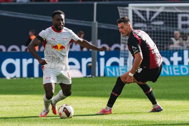 September 20, 2026, xjmrgnx, Soccer, Bundesliga 1, Bayer 04 Leverkusen vs. RB Leipzig: A tackle between Ridle Baku (17), Leipzig and Patrik Schick (14), Leverkusen. DFL and DFB regulations prohibit any use of photographs as image sequences and or quasi-video. Leverkusen