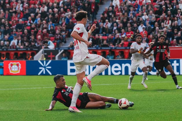 September 20, 2026, xjmrgnx, Soccer, Bundesliga 1, Bayer 04 Leverkusen vs. RB Leipzig, Facundo Medina 2, Leverkusen clears the ball with a sliding tackle in front of Tidiam Gomis 27, Leipzig DFL DFB REGULATIONS PROHIBIT ANY USE OF PHOTOGRAPHS AS IMAGE SEQUENCES AND OR QUASI-VIDEO Leverkusen