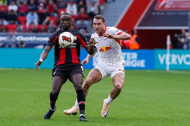 LEVERKUSEN - Moussa Diaby of Bayer Leverkusen battles for possession with David Raum of RB Leipzig during the Bundesliga match between Bayer 04 Leverkusen and RB Leipzig at the BayArena on September 20, 2026, in Leverkusen, Germany. MARCEL TER BALS ANP Bundesliga 2026 27 xVIxANPxSportx xMarcelxterxBalsxIVx 569402820 originalFilename: 569402820.jpg