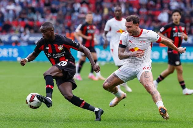 LEVERKUSEN - Moussa Diaby of Bayer Leverkusen battles for possession with David Raum of RB Leipzig during the Bundesliga match between Bayer 04 Leverkusen and RB Leipzig at the BayArena on September 20, 2026, in Leverkusen, Germany. MARCEL TER BALS ANP Bundesliga 2026 27 xVIxANPxSportx xMarcelxterxBalsxIVx 569402831 originalFilename: 569402831.jpg