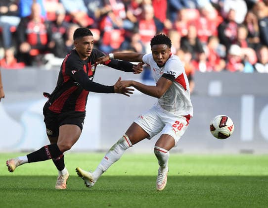 September 20, 2026, xophax, Soccer, Bundesliga 1, Bayer 04 Leverkusen vs. RB Leipzig: Ezequiel Fernández (left, Bayer 04) and Christopher Nkunku (left, RB Leipzig). DFL and DFB regulations prohibit any use of photographs as image sequences and or quasi-video. Leverkusen