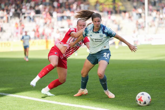Google Pixel Women s Bundesliga: SC Freiburg vs. Bayer 04 Leverkusen, September 20, 2026. A tackle between Lilla Turanyi (Bayer 04 Leverkusen, 24) and Luca Emily Birkholz (SC Freiburg), 23 Google Pixel Women s Bundesliga SC Freiburg vs. Bayer 04 Leverkusen, Dreisamstadion, September 20, 2026 DFB and DFL regulations prohibit any use of photographs as image sequences and or quasi-video. Copyright: xBEAUTIFULxSPORTS Boscox