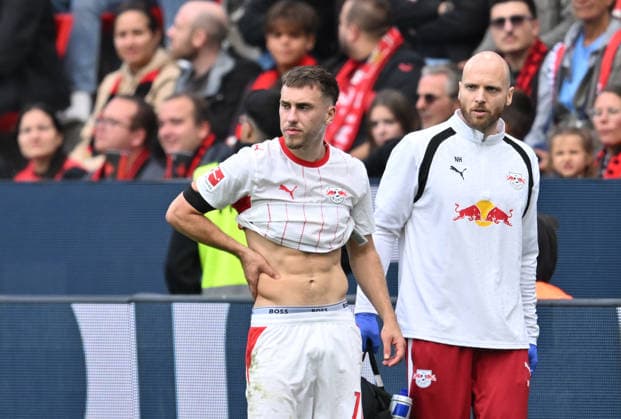 Brajan Gruda of RB Leipzig is injured; soccer injury, Bundesliga 1, Matchday 4, Bayer 04 Leverkusen vs. RB Leipzig, on September 20, 2026, in Leverkusen, Germany. DFL regulations prohibit any use of photographs as image sequences and or quasi-video. Ã‚Â