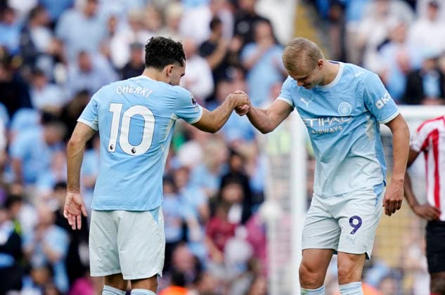 Manchester, England, 20th September 2026. Erling Haaland of Manchester City celebrates scoring their fifth goal with Rayan Cherki of Manchester City during the Manchester City vs Sunderland Premier League match at the Etihad Stadium, Manchester. Picture credit should read: Andrew Yates Sportimage EDITORIAL USE ONLY. No use with unauthorised audio, video, data, fixture lists, club league logos or live services. Online in-match use limited to 120 images, no video emulation. No use in betting, games or single club league player publications. SPI_077_AY_ManCity_Sunderland SPI-5012-0079