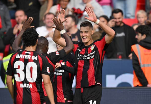 Patrik Schick of Bayer Leverkusen celebrates after scoring the 1-0 goal; from left to right: Ibrahim Maza of Bayer Leverkusen, Moussa Diaby of Bayer Leverkusen, Soccer, Bundesliga, Matchday 4, Bayer 04 Leverkusen vs. RB Leipzig, on September 20, 2026, in Leverkusen, Germany. DFL regulations prohibit any use of photographs as image sequences and or quasi-video.
