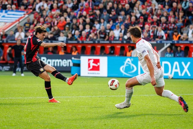 LEVERKUSEN, GERMANY - SEPTEMBER 20, 2026: Miguel Gutiérrez (Bayer 04 Leverkusen, 3) shoots on the goal scoring the 2-0 during the German Bundesliga match on gameday 4 between Bayer 04 Leverkusen vs. RB Leipzig at BayArena on September 20, 2026 in Leverkusen, Germany. DFL REGULATIONS PROHIBIT ANY USE OF PHOTOGRAPHS AS IMAGE SEQUENCES AND OR QUASI-VIDEO. Northrhine-Westphalia Germany Copyright: xAxelxKohringx