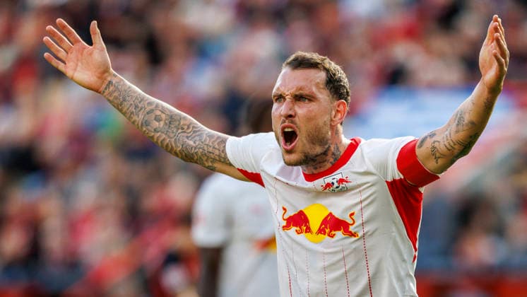 LEVERKUSEN, GERMANY - SEPTEMBER 20, 2026: David Raum (RB Leipzig, 22) gestures during the German Bundesliga match on gameday 4 between Bayer 04 Leverkusen vs. RB Leipzig at BayArena on September 20, 2026 in Leverkusen, Germany. DFL REGULATIONS PROHIBIT ANY USE OF PHOTOGRAPHS AS IMAGE SEQUENCES AND OR QUASI-VIDEO. Northrhine-Westphalia Germany Copyright: xAxelxKohringx