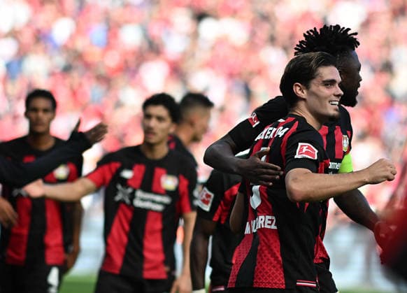 September 20, 2026, xophax, Soccer, Bundesliga 1, Bayer 04 Leverkusen vs. RB Leipzig: Miguel Ortega Gutierrez, on the right with Edmond Tapsoba—both of Bayer 04—after his goal to make it 2–0. DFL and DFB regulations prohibit any use of photographs as image sequences and or quasi-video. Leverkusen