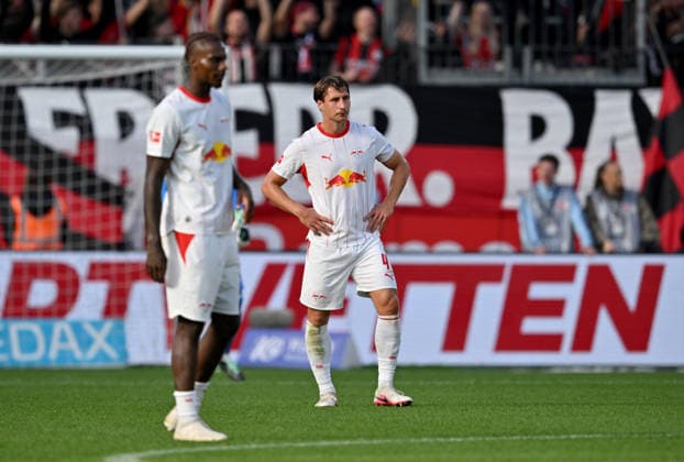 l r Ezechiel Banzuzi, RB Leipzig; Willi Orban, RB Leipzig—a disappointment in soccer, Bundesliga 1, Matchday 4, Bayer 04 Leverkusen vs. RB Leipzig, on September 20, 2026, in Leverkusen, Germany. DFL regulations prohibit any use of photographs as image sequences and or quasi-video.