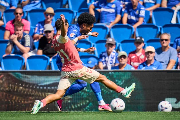 September 20, 2026, Getafe, Madrid, Spain: Johan Mojica of Getafe CF and Rafita Garrido of Malaga CF in action during the Spanish League, LaLiga EA Sports, football match played between Getafe CF and Malaga CF at Coliseum de Getafe stadium on September 20, 2026, in Getafe, Madrid, Spain. Getafe Spain - ZUMAa181 20260920_zaa_a181_047 Copyright: xAngelxPerezxMecax