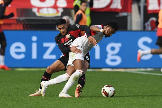 Ezequiel Fernandez (Bayer 04 Leverkusen), No. 06, in a tackle with Christopher Nkunku (RB Leipzig), No. 28, GER, Bayer 04 Leverkusen vs. RB Leipzig, soccer, Bundesliga, Matchday 4, 2026–2027 season, September 20, 2026 DFL regulations prohibit any use of photographs as image sequences and or quasi-video GER, Bayer 04 Leverkusen vs. RB Leipzig, soccer, Bundesliga, Matchday 4, 2026–2027 season, September 20, 2026, Leverkusen Copyright: xEibner-Pressefoto ThomasxThienelx EP_TTL