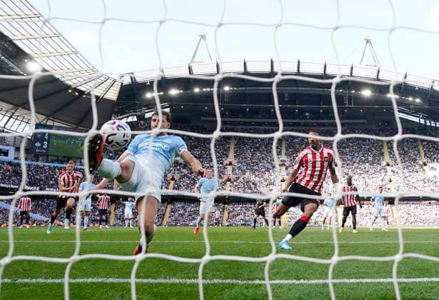 Manchester, England, 20th September 2026. Ruben Dias of Manchester City fears the ball ff the line under neath the crossbar during the Manchester City vs Sunderland Premier League match at the Etihad Stadium, Manchester. Picture credit should read: Andrew Yates Sportimage EDITORIAL USE ONLY. No use with unauthorised audio, video, data, fixture lists, club league logos or live services. Online in-match use limited to 120 images, no video emulation. No use in betting, games or single club league player publications. SPI_093_AY_ManCity_Sunderland SPI-5012-0093