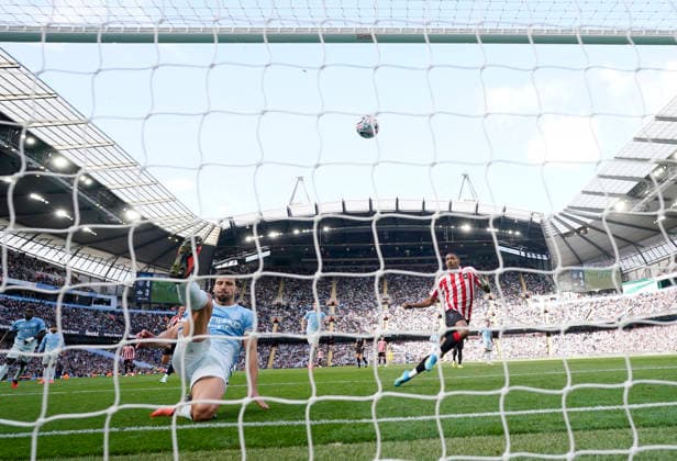 Manchester, England, 20th September 2026. Ruben Dias of Manchester City fears the ball ff the line under neath the crossbar during the Manchester City vs Sunderland Premier League match at the Etihad Stadium, Manchester. Picture credit should read: Andrew Yates Sportimage EDITORIAL USE ONLY. No use with unauthorised audio, video, data, fixture lists, club league logos or live services. Online in-match use limited to 120 images, no video emulation. No use in betting, games or single club league player publications. SPI_096_AY_ManCity_Sunderland SPI-5012-0095
