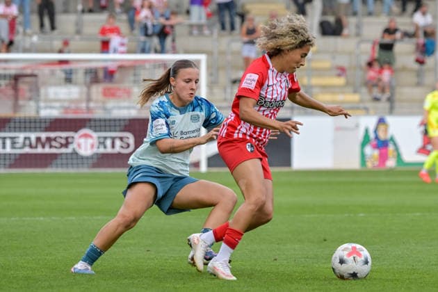 Estrella Merino, Bayer 04 Leverkusen Women, 10; Amira Arfaoui, SC Freiburg Women, 17, with the ball (GER); SC Freiburg vs. Bayer 04 Leverkusen, Women s Soccer, Bundesliga, Matchday 5, 2026–2027 Season, September 20, 2026 DFB regulations prohibit any use of photographs as image sequences and or quasi-video, GER, SC Freiburg vs. Bayer 04 Leverkusen, Women’s Soccer, Bundesliga, Matchday 5, 2026–2027 Season, September 20, 2026, Freiburg Copyright: xEibner-Pressefotox EP_THS