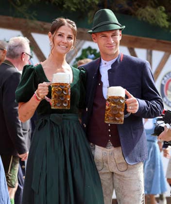 September 20, 2026, Soccer: 2026–2027 Bundesliga 1, FC Bayern Munich, The team at Oktoberfest in the Käfer Schänke; pool photo by Joshua Kimmich of FC Bayern Munich with his wife Lina