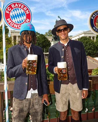 September 20, 2026, Soccer: Bundesliga 1 2026–2027, FC Bayern Munich, The team at Oktoberfest in the Käfer Schänke. Pool photo, from left: Michael Olise (FC Bayern Munich), Jamal Musiala (Bayern Munich)