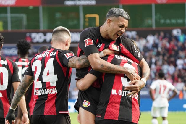Leverkusen Soccer, Bundesliga Season 2026–2027: Bayer 04 Leverkusen vs. RB Leipzig, September 20, 2026, BayArena, Leverkusen; Miguel Gutierrez, FCUBDO; Axel Medina, Bayer 04 Leverkusen; Spain; SPain; ESP; Action; Still Image