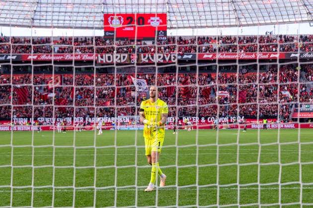 September 20, 2026, Soccer, Matchday 4 of the 1st Bundesliga, Bayer 04 Leverkusen vs. RB Leipzig; goalkeeper Mark Flekken of Bayer 04 Leverkusen, with the scoreboard above him showing the final score of 2–0; Leverkusen, BayArena, North Rhine-Westphalia, Germany; xRHR PHOTO DEx Copyright: DennisxEwert RHR-FOTOx RHR-FOTO DE