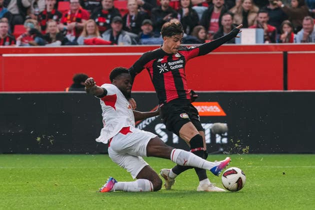September 20, 2026, xjmrgnx, Soccer 1st Bundesliga, Bayer 04 Leverkusen vs. RB Leipzig: Tackle between Ridle Baku 17, Leipzig and Afonso Moreira (9), Leverkusen. DFL and DFB regulations prohibit any use of photographs as image sequences and or quasi-video. Leverkusen