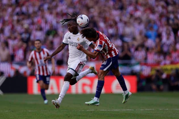 Yan Diomande of Real Madrid CF and Giuliano Simeone of Atlético de Madrid battle for the ball during the LaLiga EA Sports match between Club Atlético de Madrid and Real Madrid CF at Riyadh Air Metropolitano on September 20, 2026, in Madrid, Spain. Photo by Manu Reino, DeFodi Images