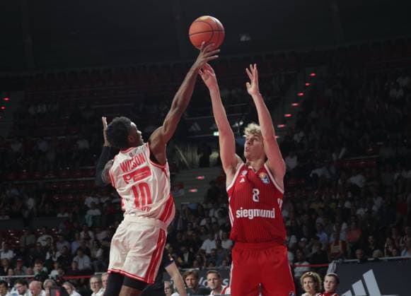 Bamberg s No. 10 WILSON vs. Bayern s No. 8 Tobias JENSEN Basketball, Bundesliga, Bayern Munich vs. Bamberg Baskets, on September 20, 2026, in Munich, Germany Source: Copyright Credit Oryk HAIST xx