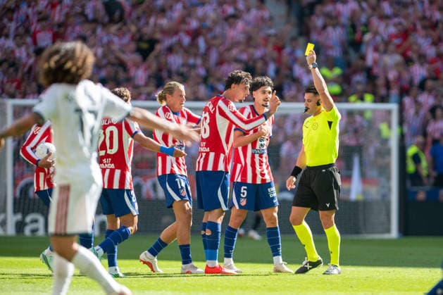 RECORD DATE NOT STATED 20th September 2026; Riyadh Air Metropolitano, Madrid, Spain; Spanish La Liga Football, Atletico Madrid versus Real Madrid; Marc Pubill of Atletico Madrid receives a yellow card AdelinaxCobos