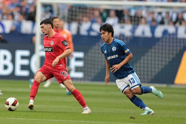 Felix Keidel of SV 07 Elversberg and Satoshi Tanaka of FC Schalke 04 during the 2026–27 Bundesliga match between FC Schalke 04 and SV Elversberg. Copyright Thomas Pakusch Copyright: Thomas Pakusch