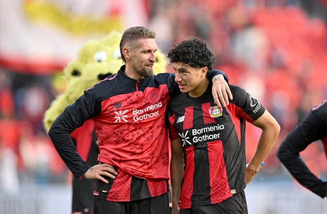 Robert Andrich (Bayer Leverkusen) and Ibrahim Maza (Bayer Leverkusen) pose for a photo after the Bundesliga 1 soccer match, Matchday 4, Bayer 04 Leverkusen vs. RB Leipzig, on September 20, 2026, in Leverkusen, Germany. DFL regulations prohibit any use of photographs as image sequences and or quasi-video content.