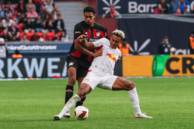 September 20, 2026, xjmrgnx, Soccer 1 Bundesliga, Bayer 04 Leverkusen vs. RB Leipzig: A tackle between Jarell Quansah (4), Leverkusen, and Antonio Nusa (7), Leipzig. DFL and DFB regulations prohibit any use of photographs as image sequences and or quasi-video. Leverkusen