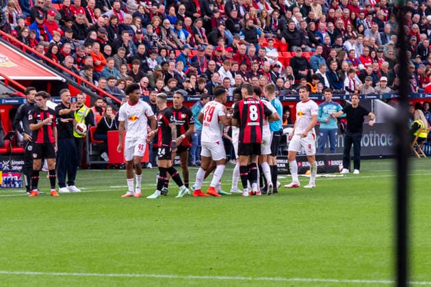 September 20, 2026, Soccer, Matchday 4 of the 1. Bundesliga, Bayer 04 Leverkusen vs. RB Leipzig; a group of players forms, led by Afonso Moreira of Bayer 04 Leverkusen and Benjamin Henrichs of RB Leipzig; Leverkusen, BayArena, North Rhine-Westphalia, Germany; xRHR PHOTO DEx Copyright: DennisxEwert RHR-FOTOx RHR-FOTO DE