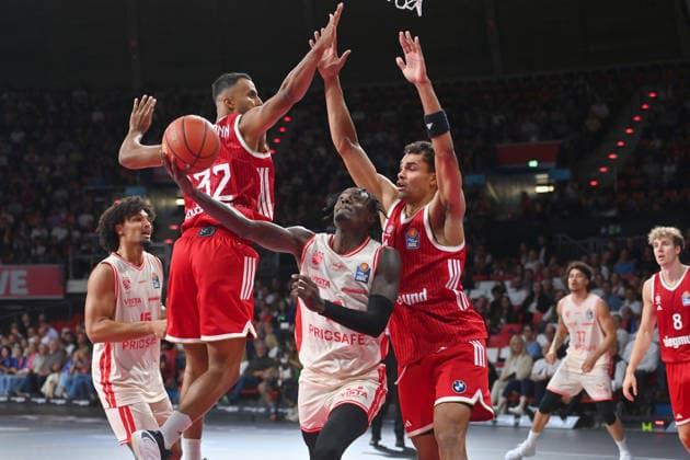 From left: Johannes THIEMANN (FCB), Trevon SCOTT (BA), Johannes THIEMANN (FCB) in action; a basketball matchup in the BBL, 2026–2027 season, FC Bayern Munich vs. Bamberg Baskets on September 20, 2026, at BMW Park