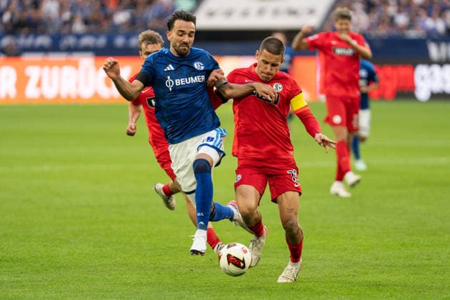 September 20, 2026, GER, Bundesliga 1, Matchday 4, FC Schalke 04 vs. SV Elversberg: A duel between Kenan Karaman (FC Schalke 04, 19) and Lukas Pinckert (SV Elversberg, 19) in Gelsenkirchen at the VELTINS Arena, Gelsenkirchen, Germany Copyright: xnordphotoxGmbHx xChristianxSchulzex
