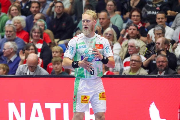 September 20, 2026, xgox, Handball: Opel HBL MT Melsungen vs. SC Magdeburg emspor; from left: Matthias Musche (Magdeburg), No. 6 on the ball, plays the ball (Kassel)