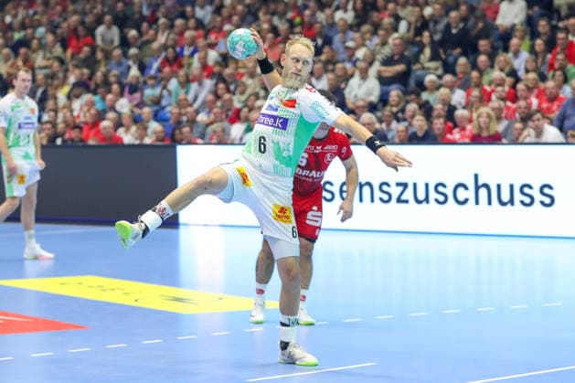 September 20, 2026, xgox, Handball: Opel HBL MT Melsungen vs. SC Magdeburg emspor, from left: Matthias Musche (Magdeburg), 6 on a penalty throw for Kassel
