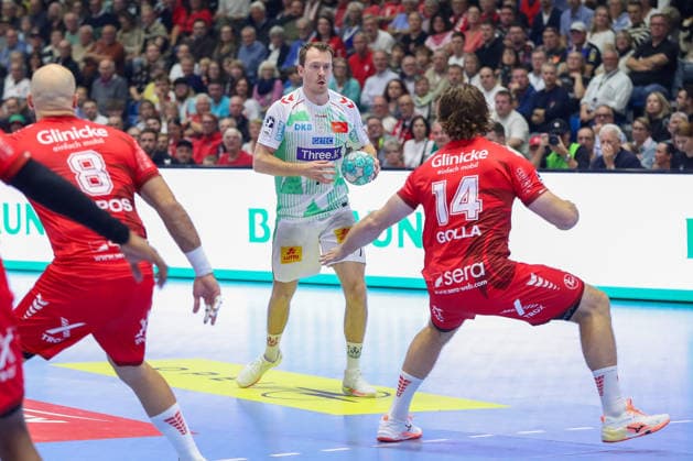 September 20, 2026, xgox, Handball Opel HBL MT Melsungen vs. SC Magdeburg emspor, from left: Felix Claar (Magdeburg), 7, Johannes Golla (Melsungen), 14; duel, battle, tackle, Kassel