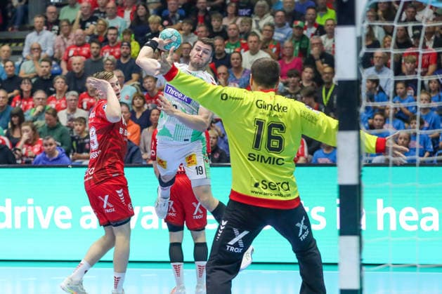 September 20, 2026, xgox, Handball Opel HBL MT Melsungen vs. SC Magdeburg emspor, from left: Elvar Oern Jonsson (Magdeburg), 19 shots on goal, goal scorers, scores a goal, goal, scores the goal (Kassel)