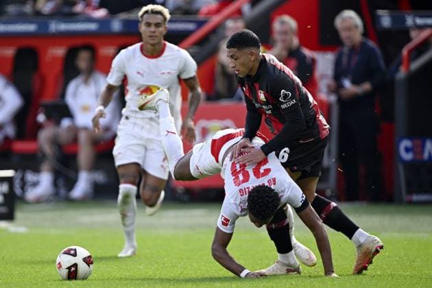 LEVERKUSEN - (lr) Christopher Nkunku of RB Leipzig, Ezequiel Fernandez of Bayer 04 Leverkusen during the match between Bayer 04 Leverkusen and RB Leipzig at the Bay Arena on 20 September 2026 in Leverkusen, Germany. ANP Bundesliga 2026 27 xVIxANPxSportx xGerritxvanxKeulenxIVx 569419568 originalFilename: 569419568.jpg
