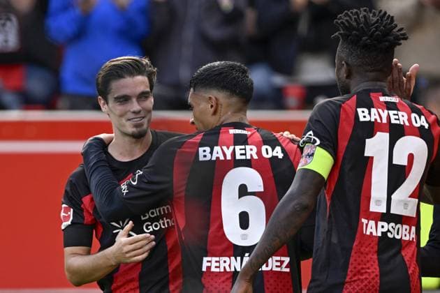 LEVERKUSEN - Bayer 04 Leverkusen celebrates the goal of Miquel Gutierrez of Bayer 04 Leverkusen (l) during the match between Bayer 04 Leverkusen and RB Leipzig at the Bay Arena on 20 September 2026 in Leverkusen, Germany. ANP Bundesliga 2026 27 xVIxANPxSportx xGerritxvanxKeulenxIVx 569419597 originalFilename: 569419597.jpg